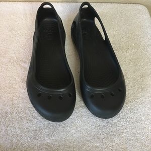 Croc slip into shoes in black in size 7. Excellent condition.